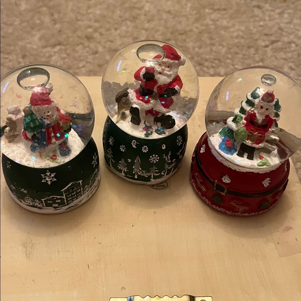 Miniature Snow Globe trio Set with snowman, nutcracker, and Santa